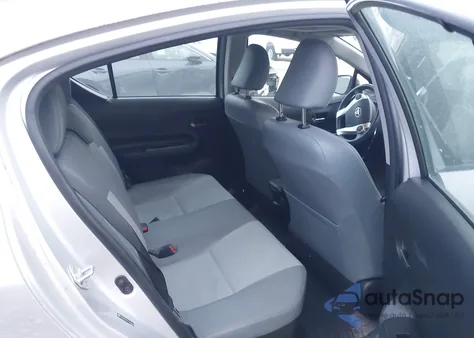 2015 Toyota Prius C Four from USA, damaged, VIN JTDKDTB37F1088893